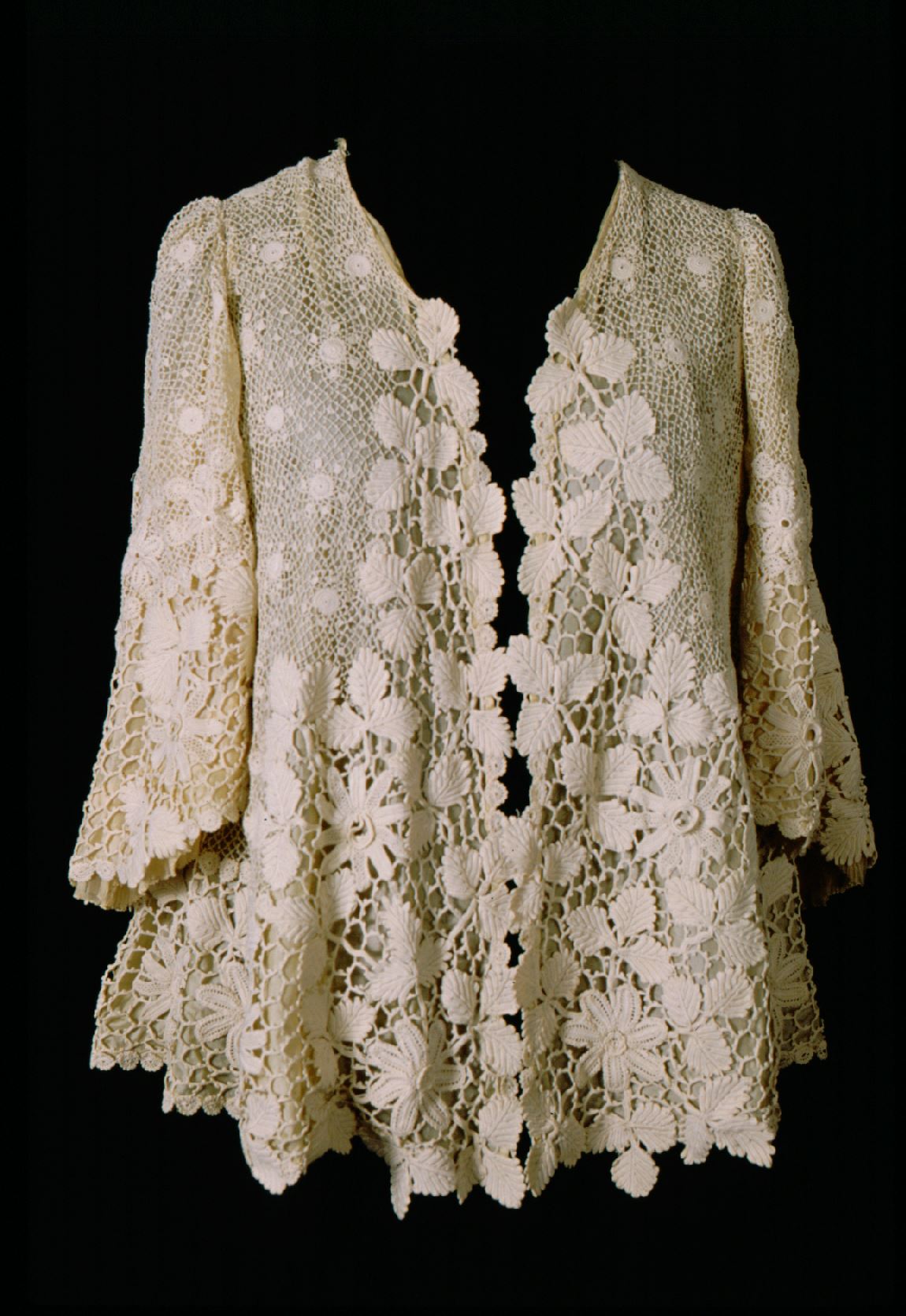 Irish crochet jacket in light yellow silk.
