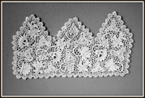 Crown shaped Irish Crochet cuff with intricate floral motifs