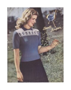 Pattern cover for short sleeve sweater with flower motif on upper body.