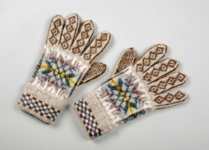 Pair of gloves with traditional geometric Fair Isle designs in brown, white, grey, blue and yellow
