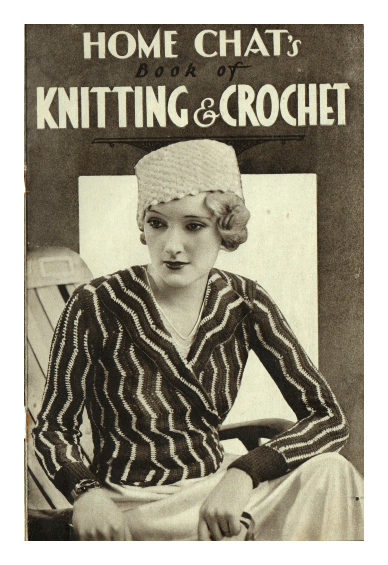 Cover of Home Chat's Book of Knitting & Crochet showing lady with striped knit cross-over cardigan and textured knitted hat