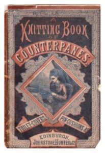 Cover of A Knitting Book of Counterpanes. Ornate decorative frames around a central image of a lady knitting.