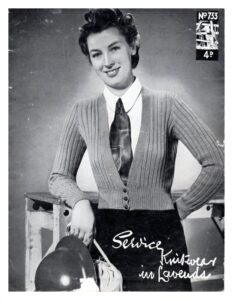 Cover of Service Knitwear in Lavenda showing lady wearing ribbed cardigan with low and wide neckline to show a tie.