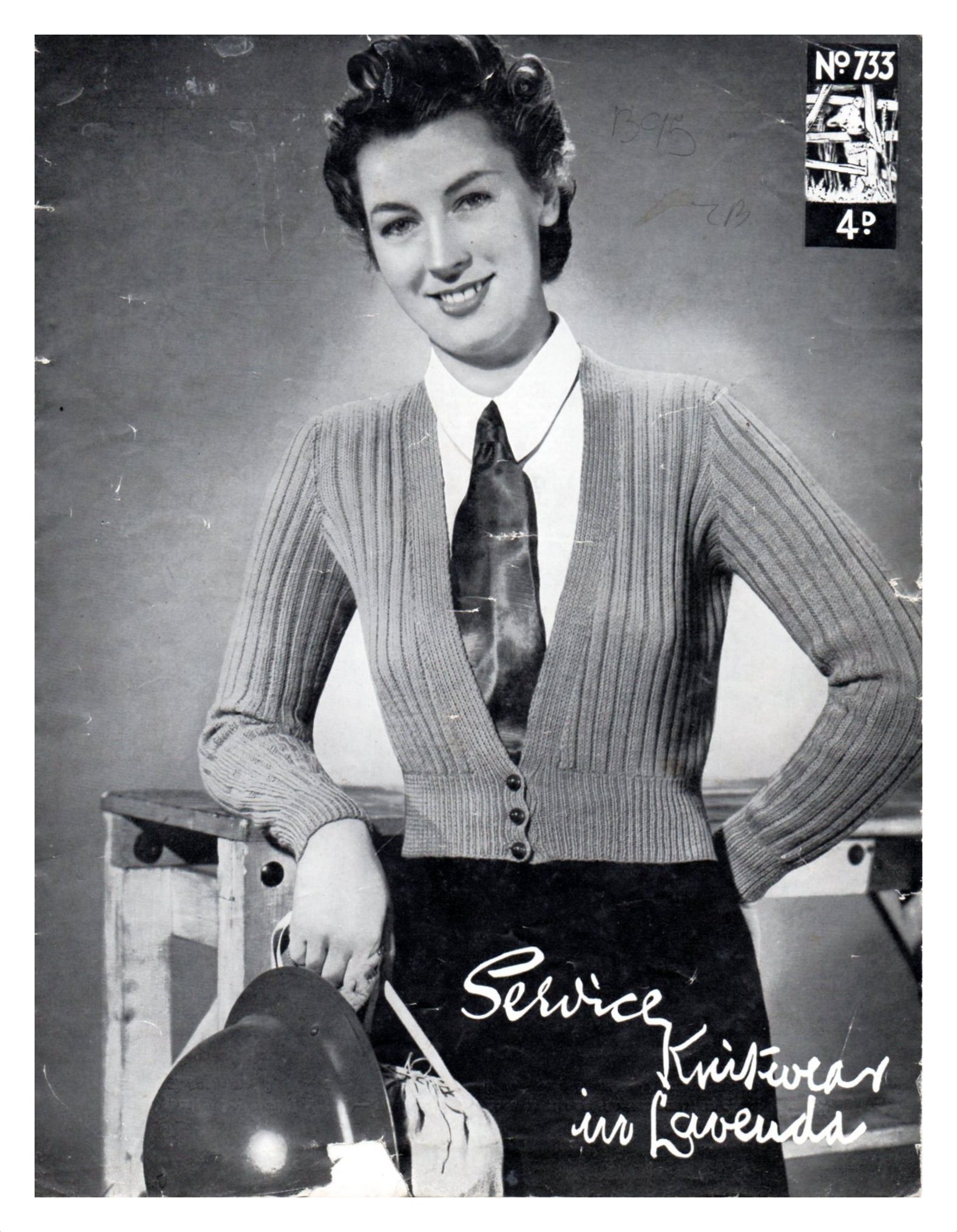 Cover of Service Knitwear in Lavenda showing lady wearing low neck robbed cardigan