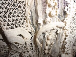 Crochet lizard as part of an Irish Crochet garment