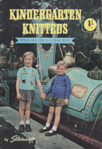 Cover of Kidergarten Knitteds showing girl with alphabet and animal design short sleeve sweater and a boy with cabled cardigan.
