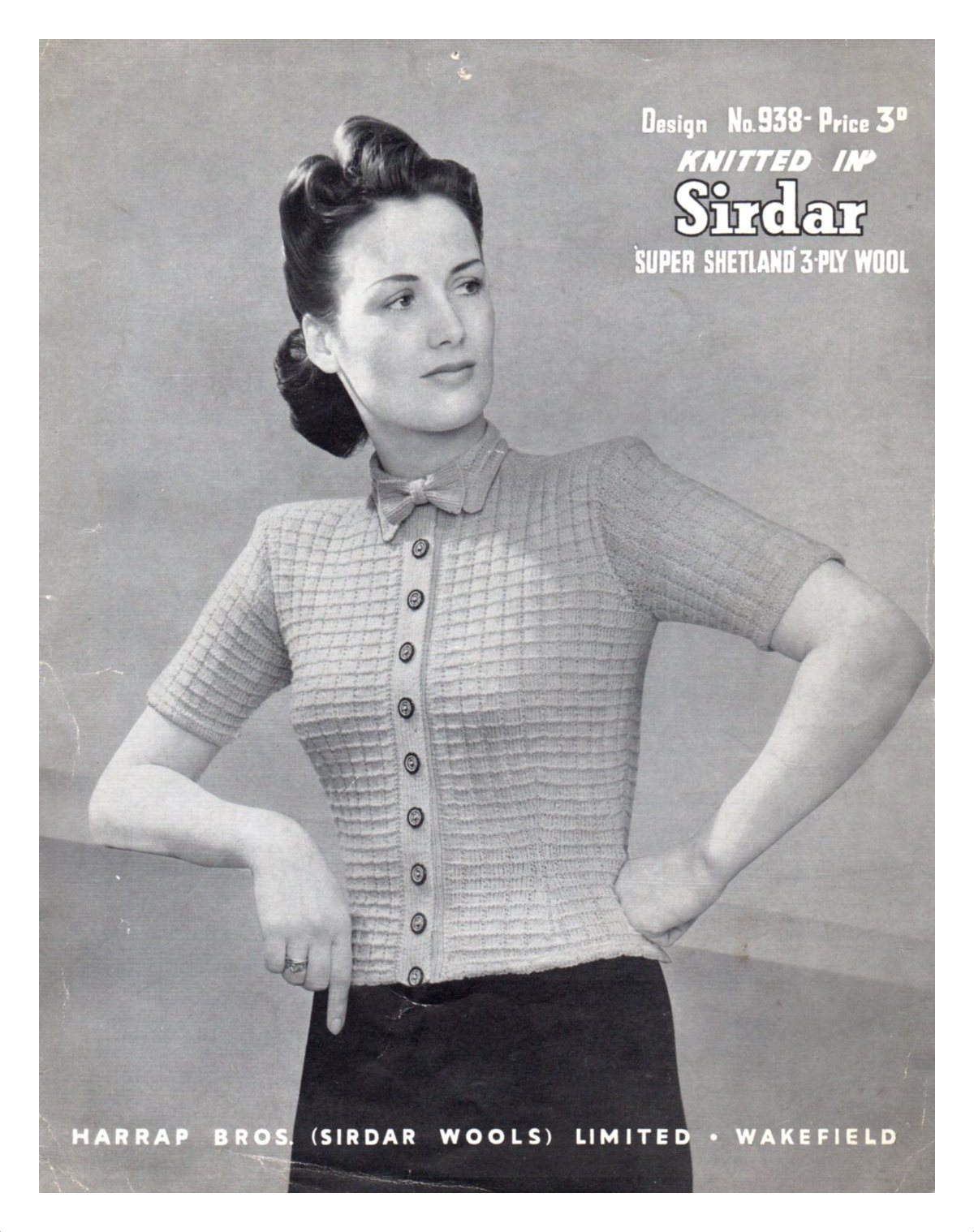 Sirdar cover for 3 ply pattern. :ady wearing cardigan with short sleeves and textured chequerboard pattern.