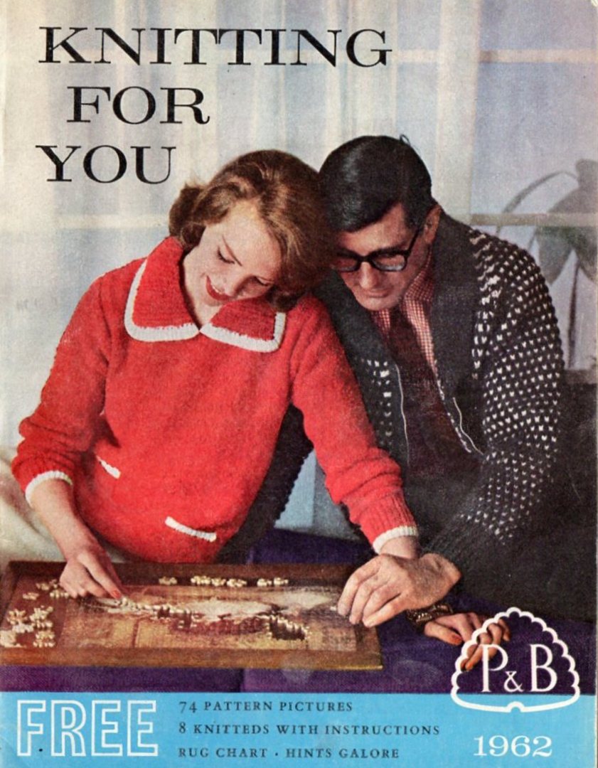Cover of P&B Knitting for You 1962. Shows lady wearting red sweater with white borders and man wearing zipped grey and white cardigan - solving an jigsaw puzzle