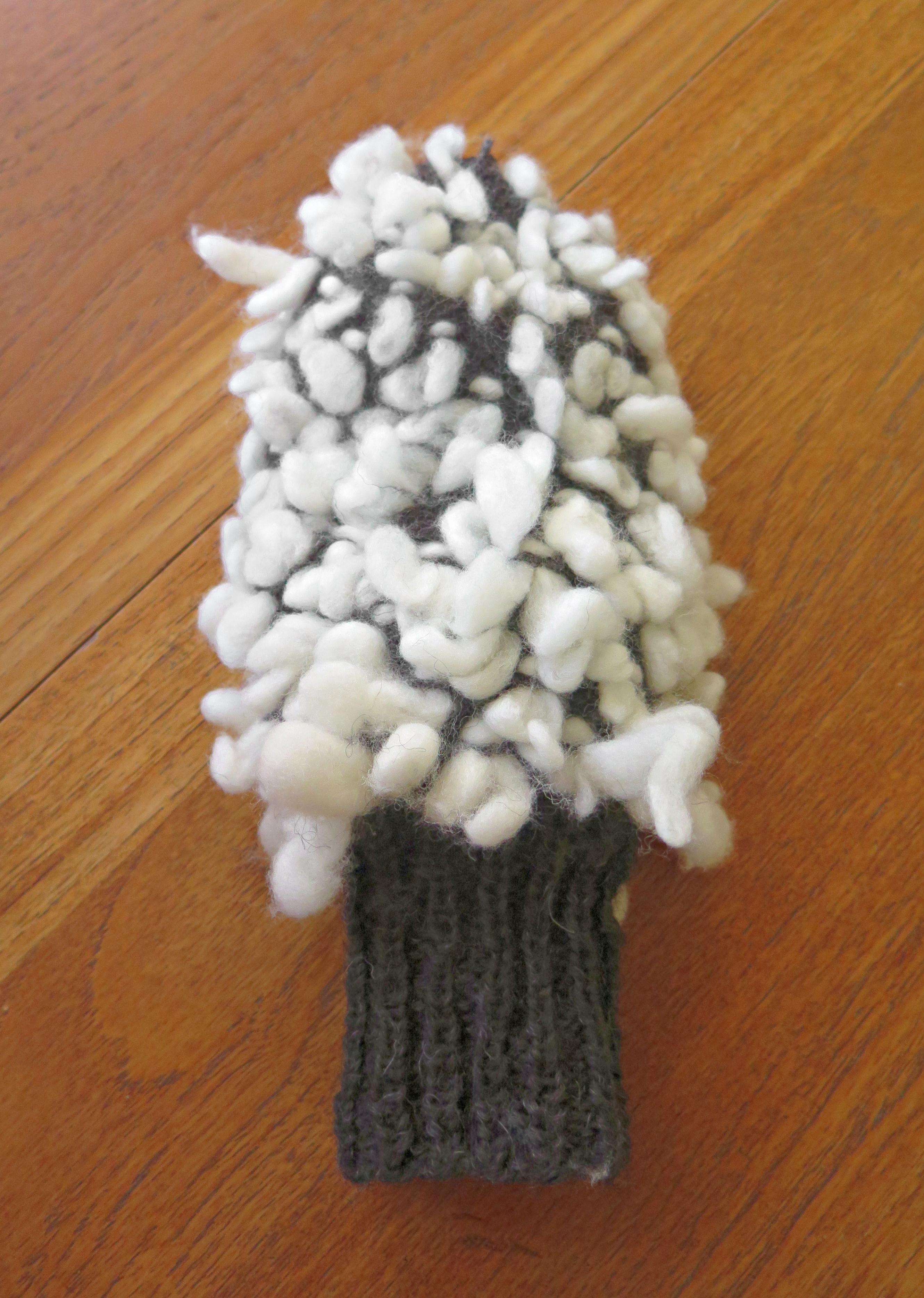 Inside of thrummed mitten showing the roving.