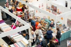 People flocking around stands at The Stitch Festival