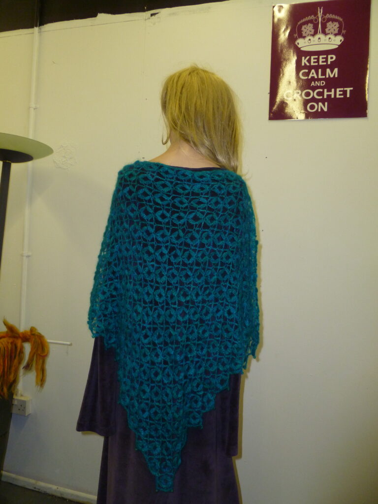 Full length view of lacis crochet shawl