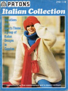 Cover of Patons 210 - Italian Collection showing lady wearing red had and scarf and knitted low-necked, cream chunky jacket (sweater) and a blued turtle neck knitted sweater underneath,