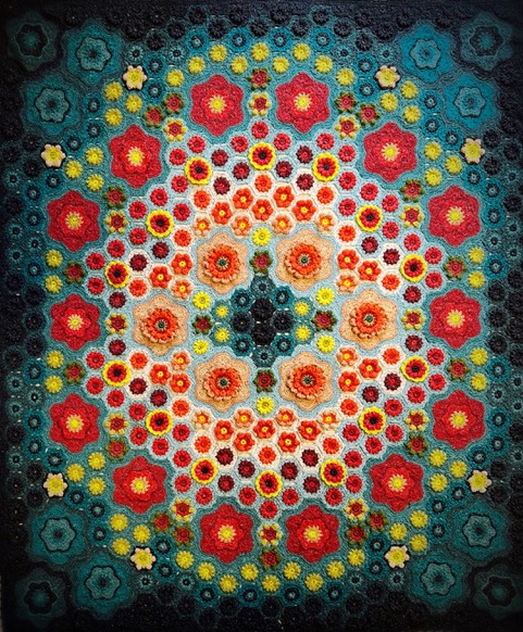 Crochet blanket with flower motifs