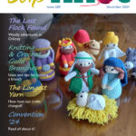 Front cover of Slipknot 184 - December 2025 with photograph of crocheted nativity scene. Headlines: The Lost Flock Found, Knitting & Crochet Guild Branches, The Longest Yarn, Convention '24