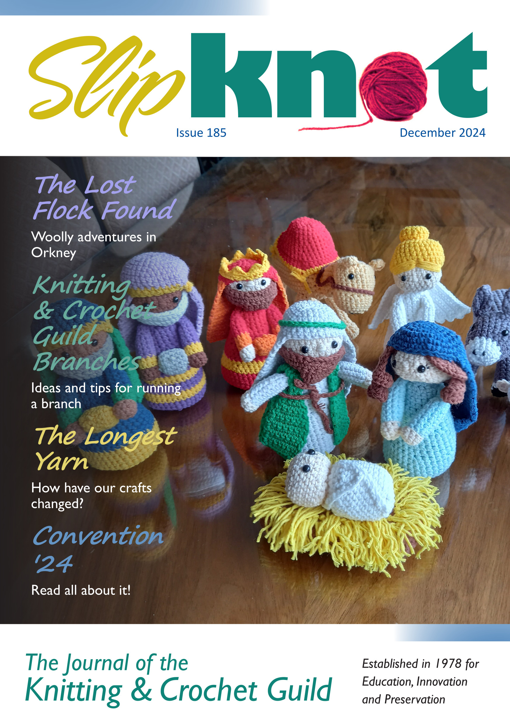 Front cover of Slipknot 184 - December 2025 with photograph of crocheted nativity scene. Headlines: The Lost Flock Found, Knitting & Crochet Guild Branches, The Longest Yarn, Convention '24