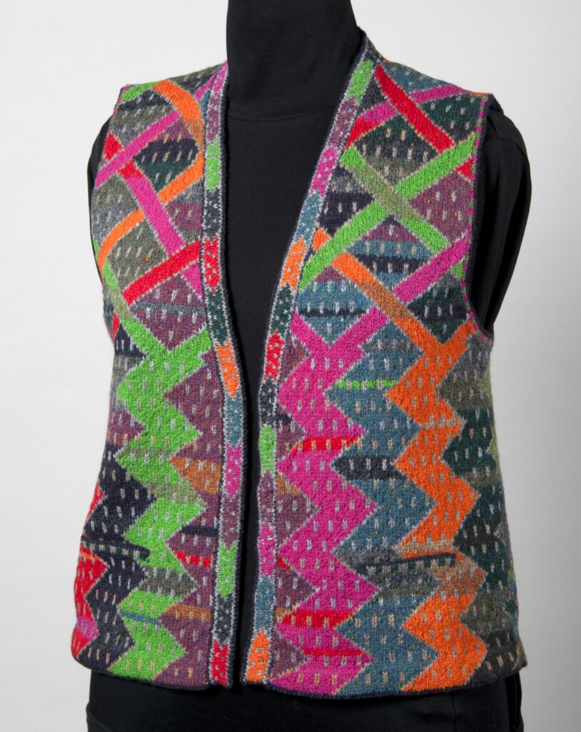 Waistcoat with brightly coloured neon zig-zags