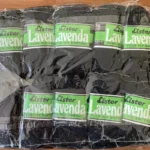 Photo of pack of 10 balls of black vintage Lister Lavenda 4-ply wool.