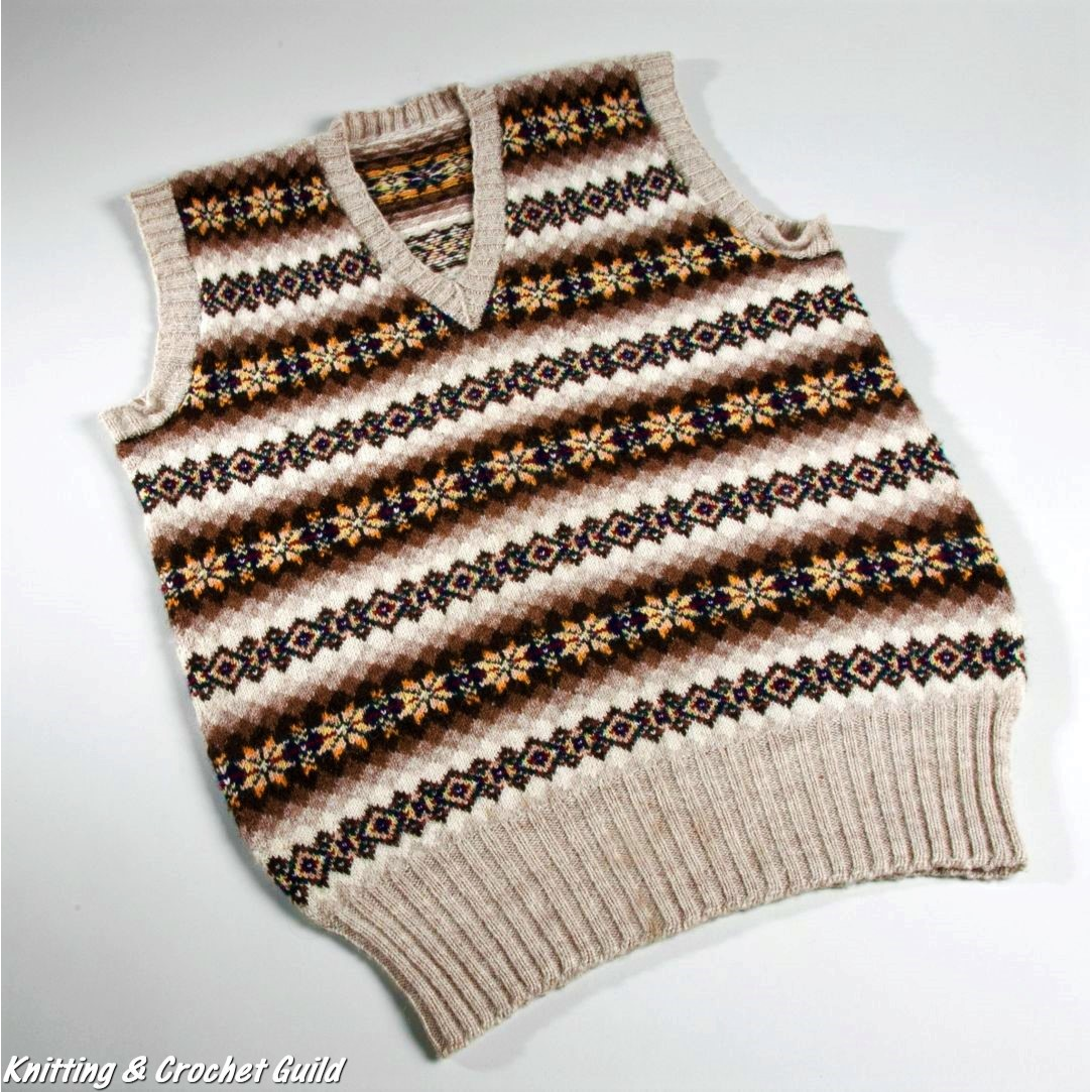 Colour patterned pullover hand knitted in Shetland using ten colours of wool