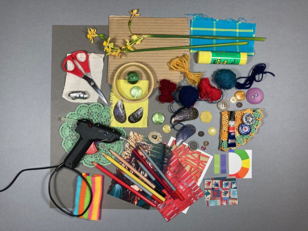 An assortment of objects used in the creation of a mood board.