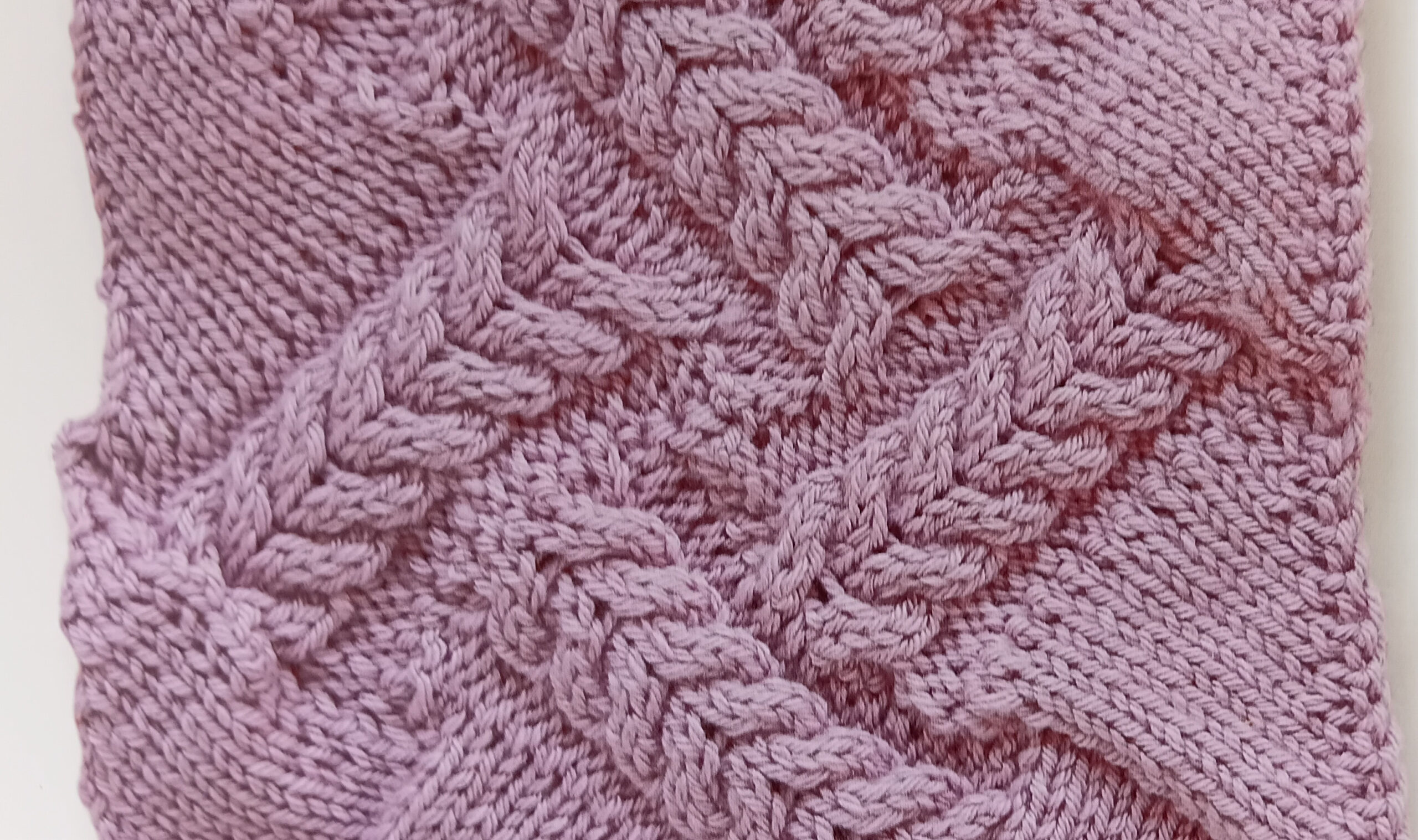 Knitted entrelac with cables
